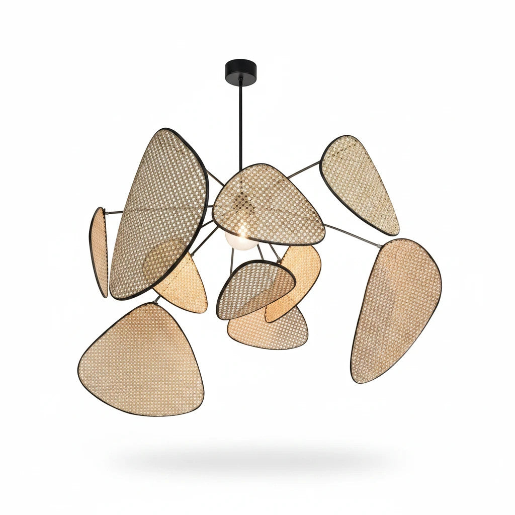 Lysverden sculptural pendant light featuring woven rattan leaf-shaped shades with a sleek black metal frame.