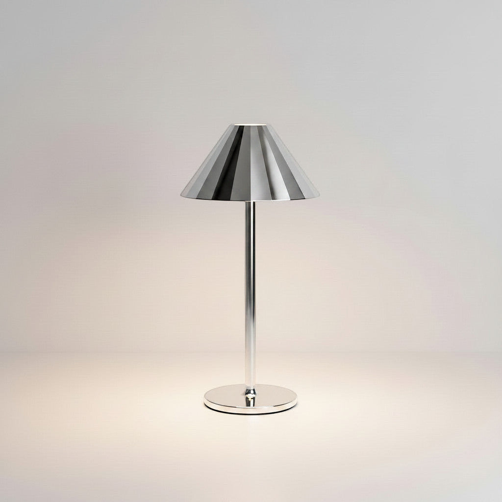 Lysverden restaurant table lamp with a silver pleated umbrella shade and a round base. Touch control, 4 color temperatures, 3 dimming levels.