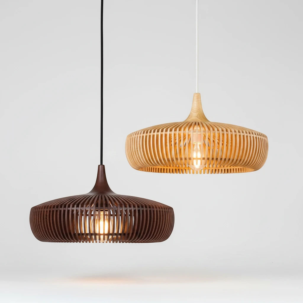 Lysverden ribbed wooden pendant lamps in light and dark wood with a rounded Scandinavian design.