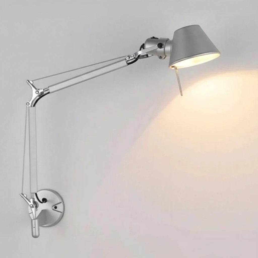Lysverden silver metal adjustable swing arm wall lamp with a directional head for reading or office work.