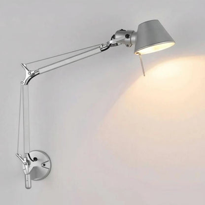 Lysverden silver metal adjustable swing arm wall lamp with a directional head for reading or office work.