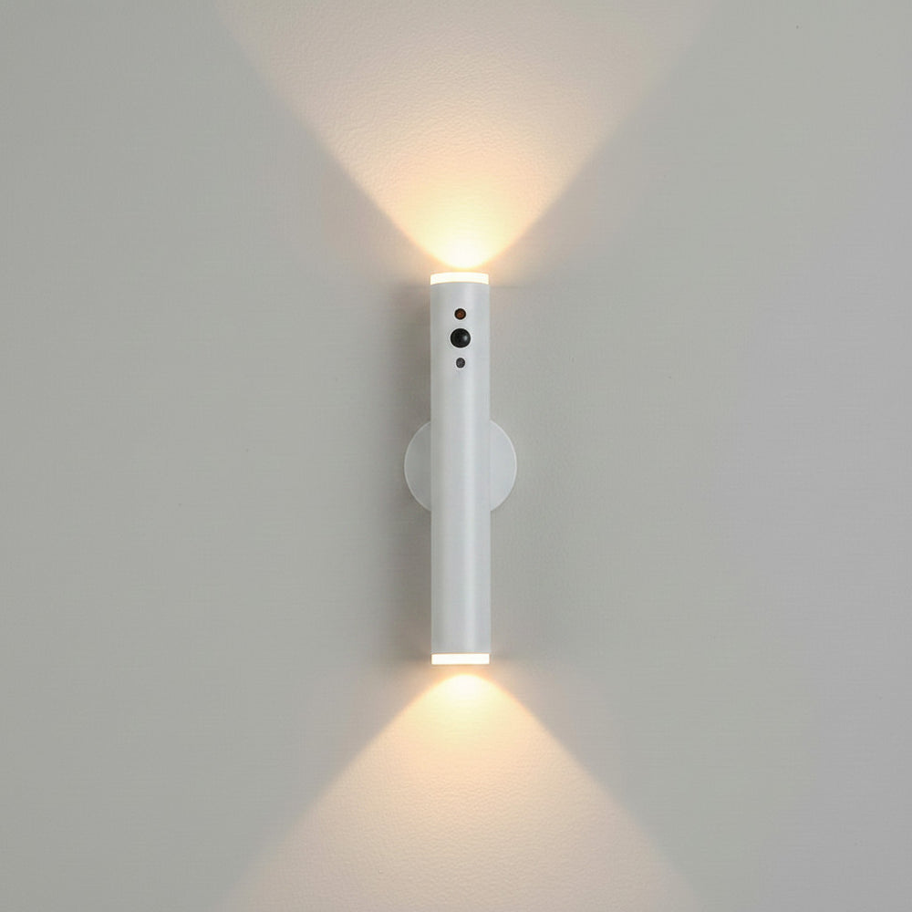 Lysverden slim brass metal wall lamp with up/down light, remote control, and magnetic mount.