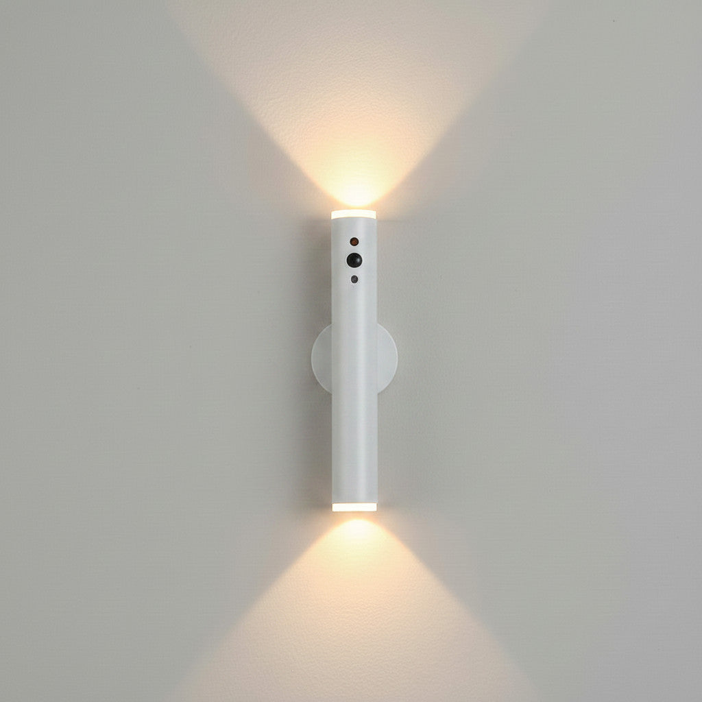 Lysverden slim brass metal wall lamp with up/down light, remote control, and magnetic mount.