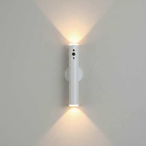 Lysverden slim brass metal wall lamp with up/down light, remote control, and magnetic mount.
