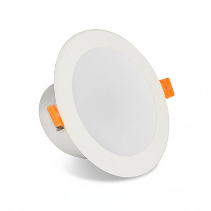 Lysverden white slim round LED downlight with orange spring clips, 18mm deep, PMMA front for glare-free light.