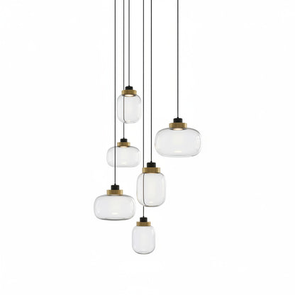 Lysverden cluster pendant light with smoke glass shades and brass accents hanging at varying heights