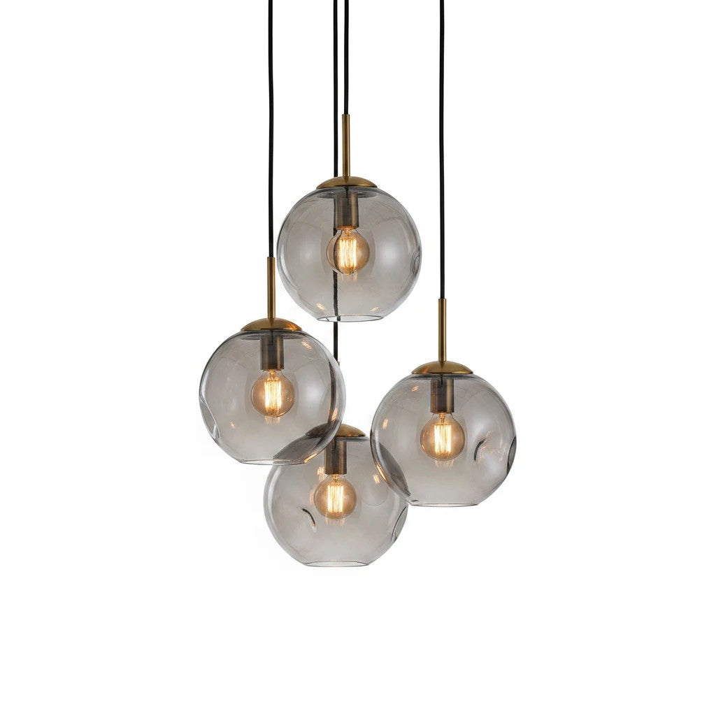 Lysverden glass pendant light cluster with four hand-blown smoke grey glass globes and brass fixtures