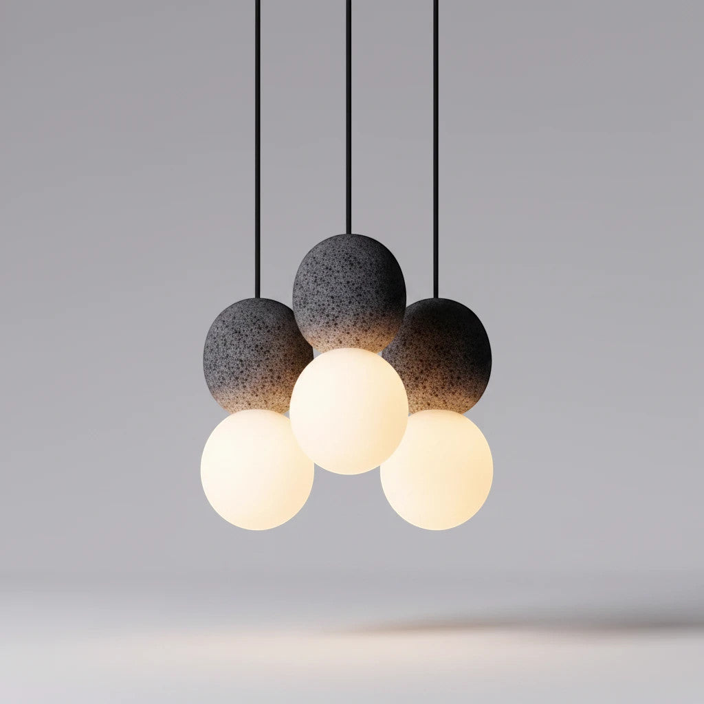 Lysverden Steinpendel cluster pendant light with grey textured stone spheres and glowing opal glass globes