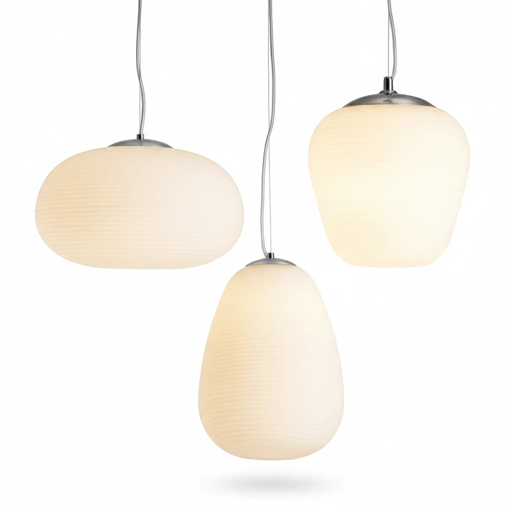 Lysverden Steinpendel set of three organic matte white glass pendant lights with a sculptural Nordic design.