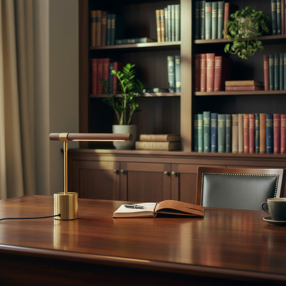 Lysverden T-shaped desk lamp with brass base and wood detail. Adjustable head, E27 socket. Ideal for study or reading.