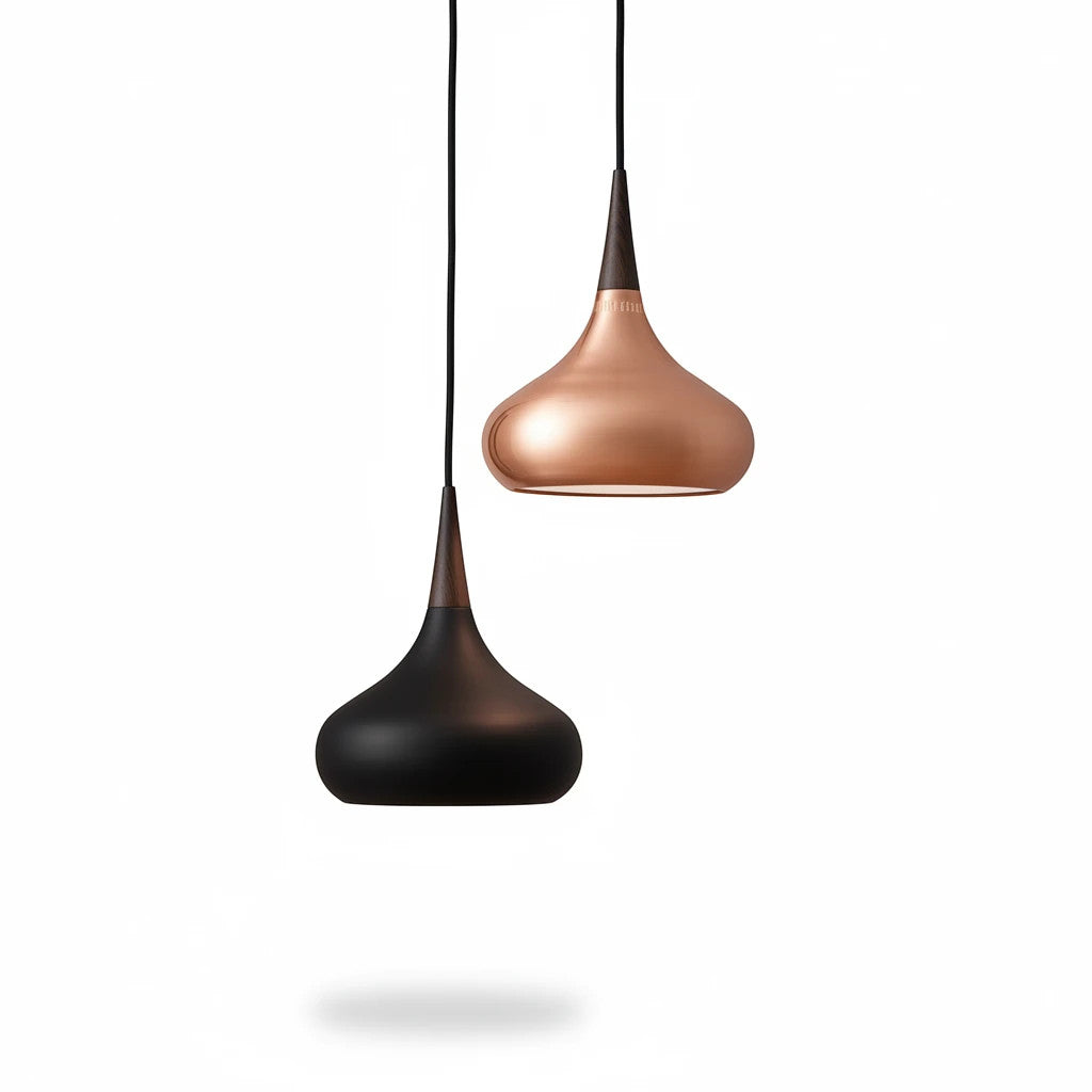 Lysverden teardrop pendant lamps in black and copper metal with wooden top details hanging against a white background.