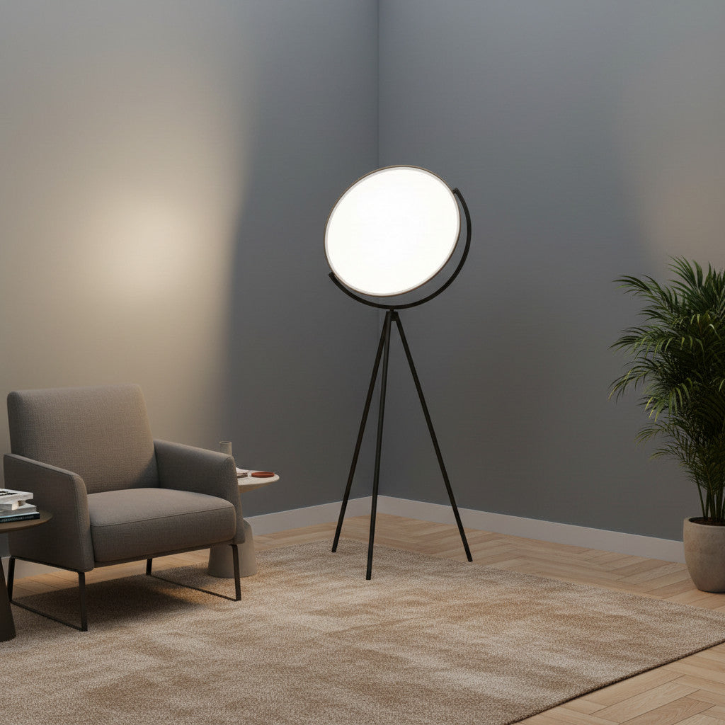 Lysverden tripod floor lamp with a large round illuminated shade and black metal legs in a modern living room