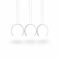 Lysverden white curved LED pendant light with three sculptural hanging arcs for modern dining room lighting.