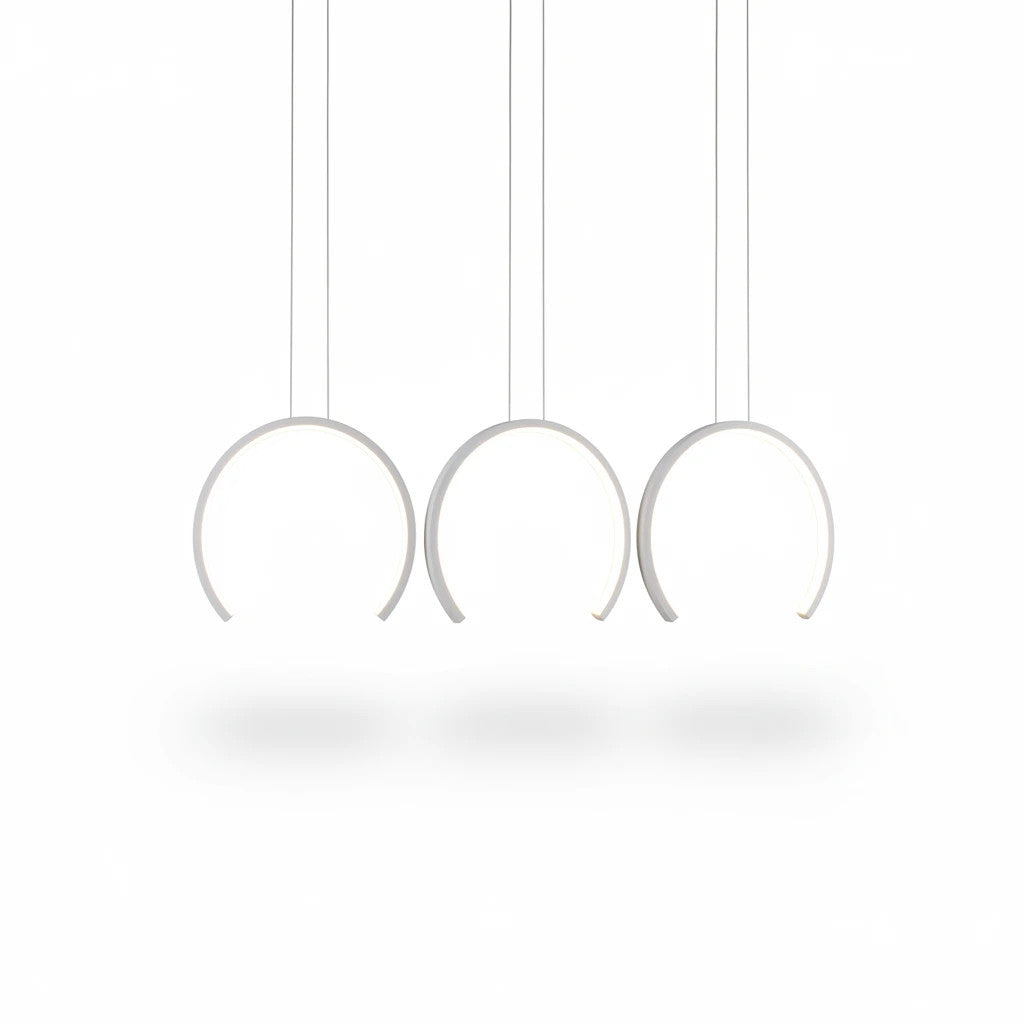 Lysverden white curved LED pendant light with three sculptural hanging arcs for modern dining room lighting.