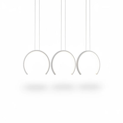 Lysverden white curved LED pendant light with three sculptural hanging arcs for modern dining room lighting.