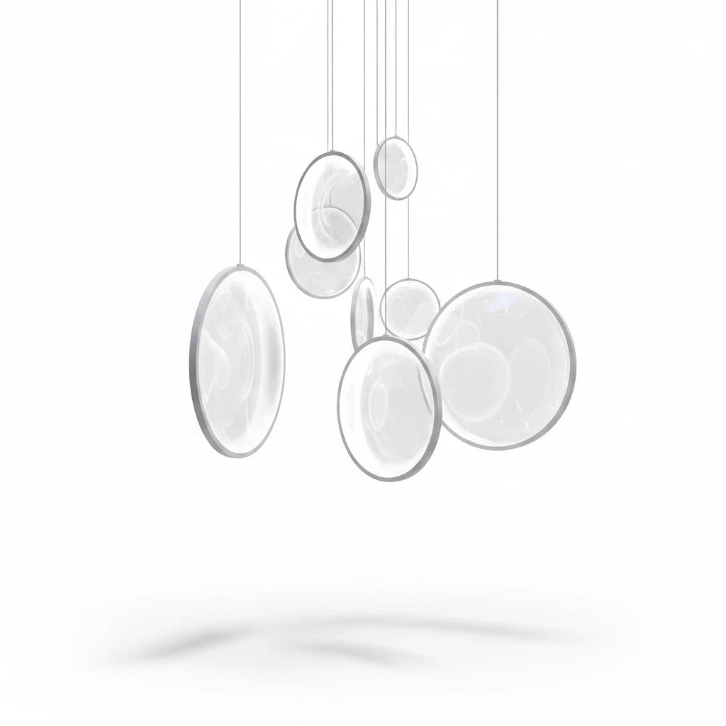 Lysverden ring-shaped LED pendant lights in white, featuring multiple suspended acrylic circles for a modern look.
