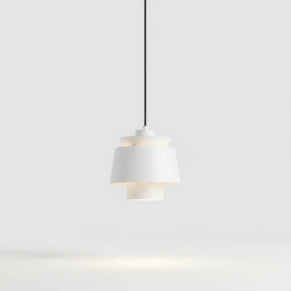 Lysverden white metal drum pendant light with a minimalist Scandinavian design hanging against a plain background