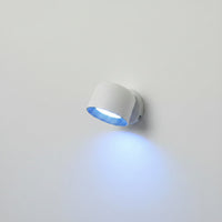 Lysverden white round LED wall spot with 360° rotation, RGB color options, and remote control. Emits blue light.