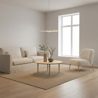 Lysverden hvit bølgependel med konsentrisk design i en minimalistisk skandinavisk stue