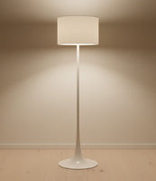 Lysverden white floor lamp with a cylindrical shade and elegant tulip base standing on a wooden floor