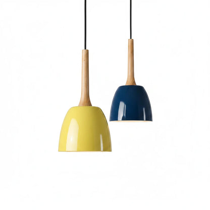 Lysverden pendant lamps with yellow and blue metal domes and light wood tops hanging against a white background.